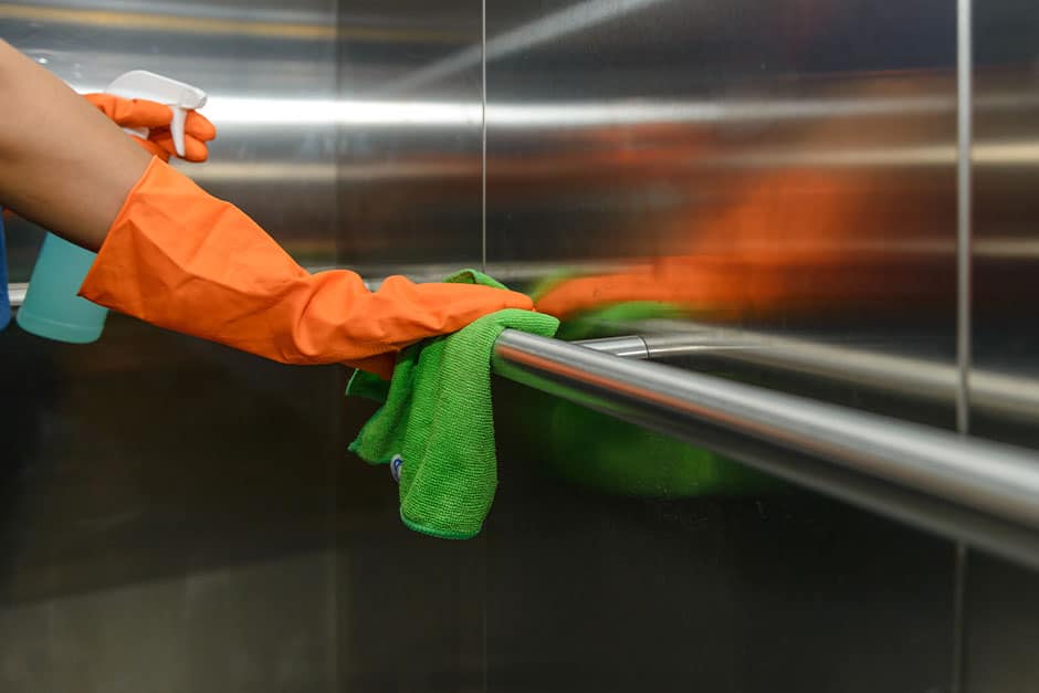Cleaning hand rail in a lift