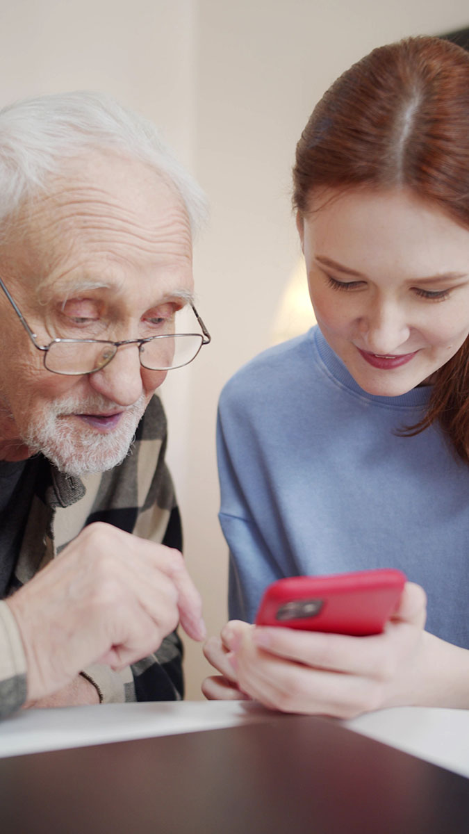 Satisfied carer checks their time management app